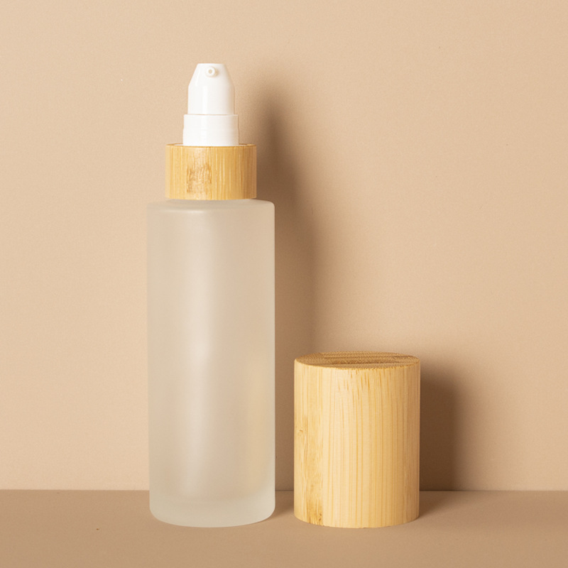 پمپ لوسیون آرایشی مات بطری اسپری مه ریز و لوسیون شیشه ای با درب چوب بامبو پمپ لوسیون آرایشی مات بطری اسپری مه ریز و لوسیون شیشه ای با درب چوب بامبو