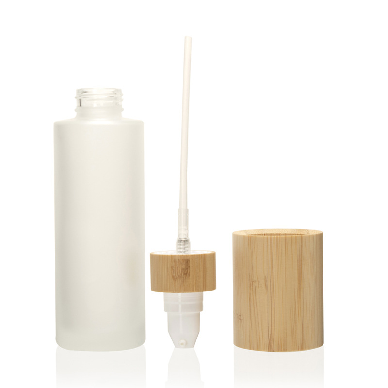 پمپ لوسیون آرایشی مات بطری اسپری مه ریز و لوسیون شیشه ای با درب چوب بامبو پمپ لوسیون آرایشی مات بطری اسپری مه ریز و لوسیون شیشه ای با درب چوب بامبو